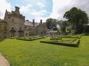 The Violet Suite Stone Cross Mansion